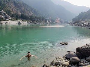 Swimming Clean River Ganga during 200 Hour Kundalini Course Nada Yoga School